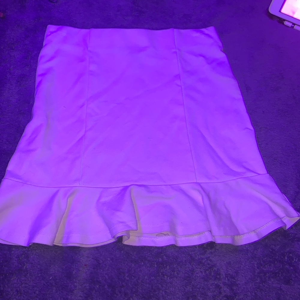 White ruffled skirt